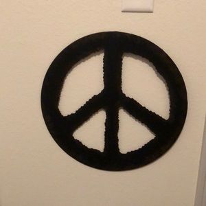 Metal peace sign wall decoration